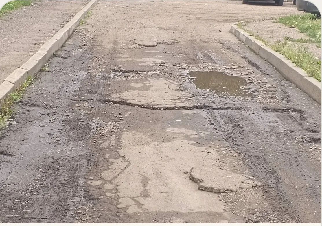 Дорога вдоль улицы Коммунальной, д. 9, к. 2
