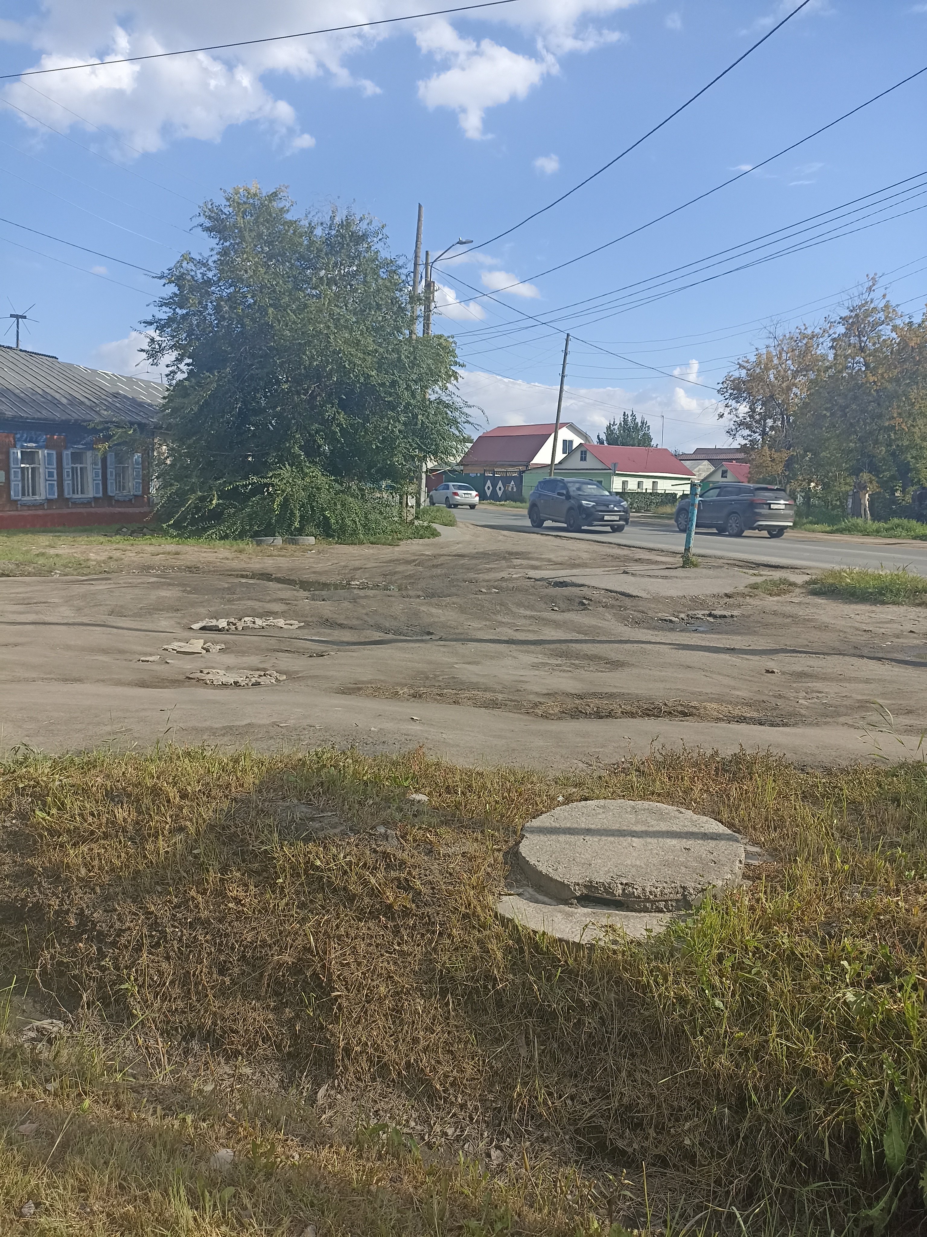 Межпроселочная дорога по улице Воронина д.82 у